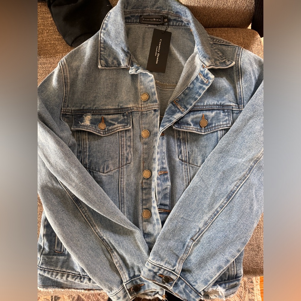 Country denim jacket. Size 10/medium. Tags attached.